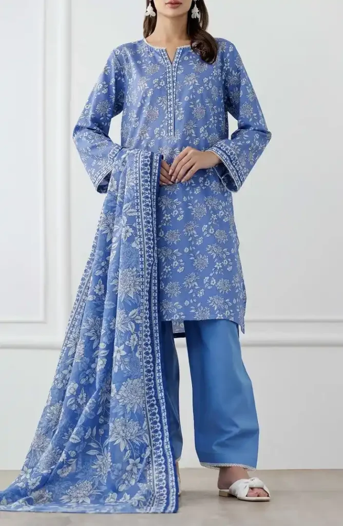 Model wearing a blue 3-piece unstitched lawn suit with floral patterns and matching dupatta.